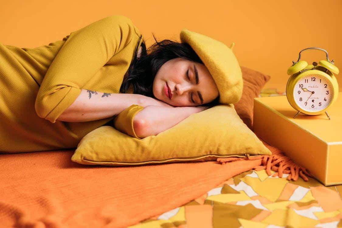 Free A Sleeping Woman In Yellow Outfit  Stock Photo