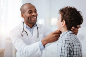 paediatrician doctor with child scaled 1